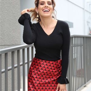 Black cotton long sleeve with ruffled sleeve detail